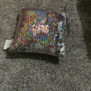 Small, sequin pillow